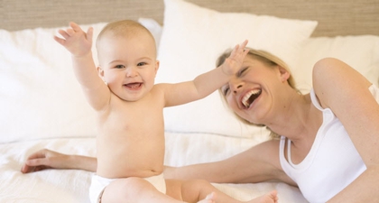 Alasan Bayi Tersenyum